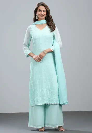 Traje de Georgette bordado en verde pastel